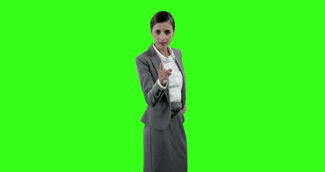 Beautiful businesswoman touching digital screen against green screen - Free Images, Stock Photos and Pictures on Pikwizard.com
