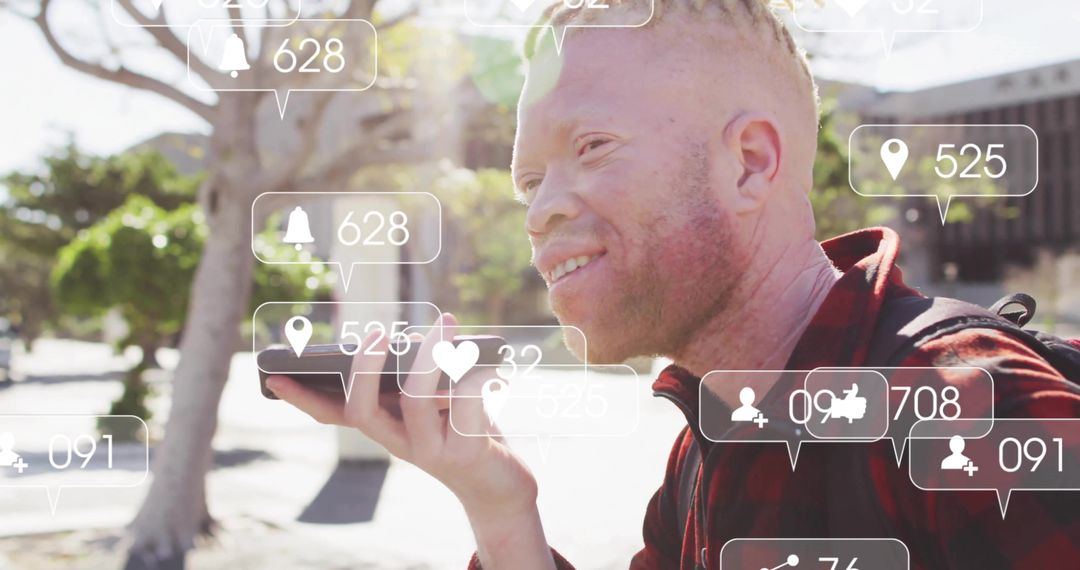 Man Holding Phone Interacting with Social Media Notifications Outdoors