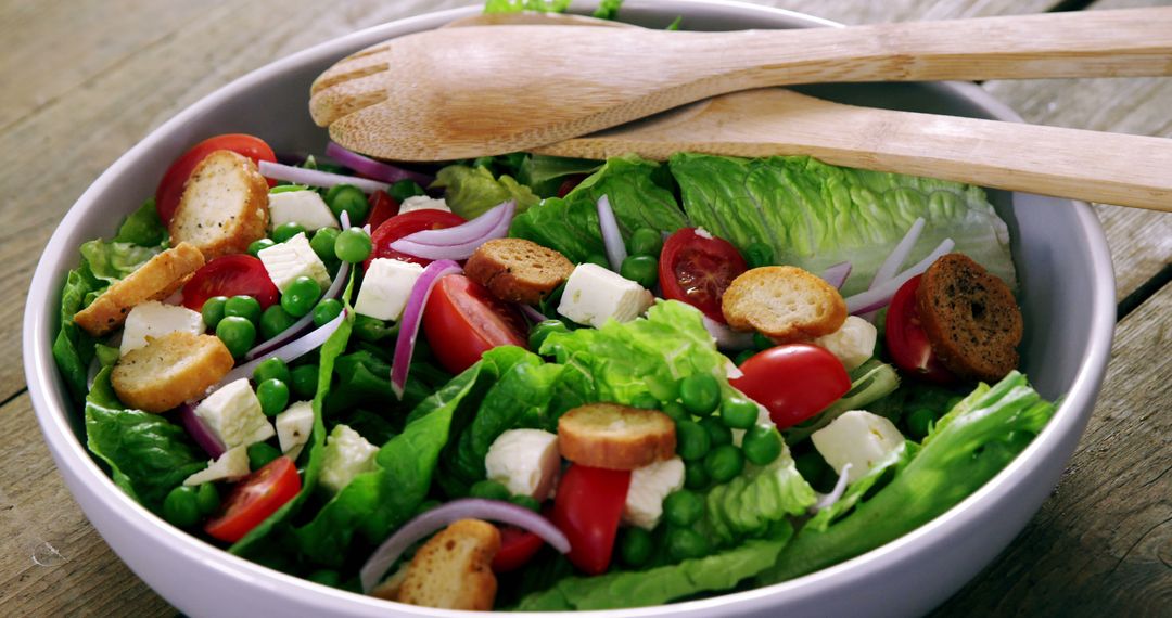 Fresh Vegetable Salad with Croutons and Feta Cheese in Bowl - Free Images, Stock Photos and Pictures on Pikwizard.com