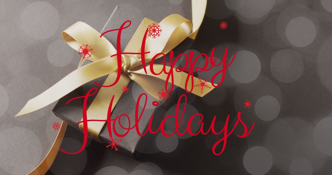 Happy Holidays Christmas Present with Bow and Snowflake Decorations