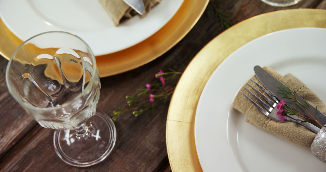 Elegant Table Setting with Golden Plates - Free Images, Stock Photos and Pictures on Pikwizard.com