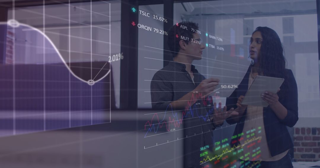 Two Professionals Discussing Financial Data with Digital Interface