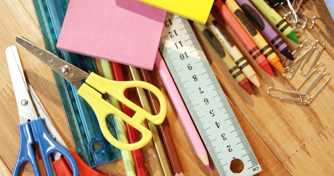 School Supplies with Scissors, Ruler, and Colored Pencils on Wooden Table - Free Images, Stock Photos and Pictures on Pikwizard.com