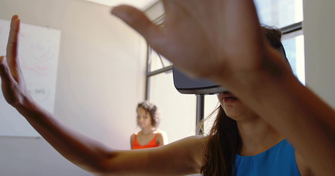 Woman Experiencing Virtual Reality in Training Setting
