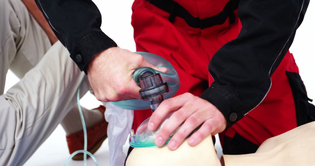 Emergency Worker Performing CPR Procedure on Manikin - Free Images, Stock Photos and Pictures on Pikwizard.com