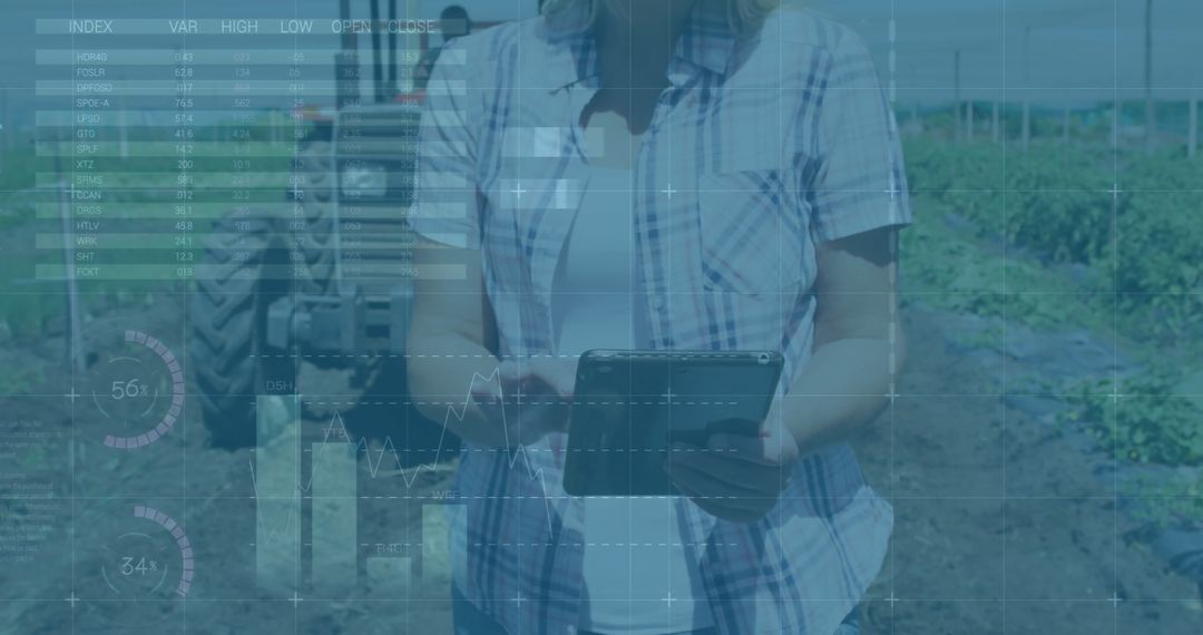 Agricultural Financial Data Being Analyzed by Farmer in Field