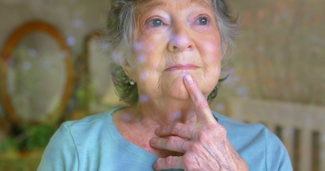 Thoughtful Elderly Woman Looking Out Window - Free Images, Stock Photos and Pictures on Pikwizard.com