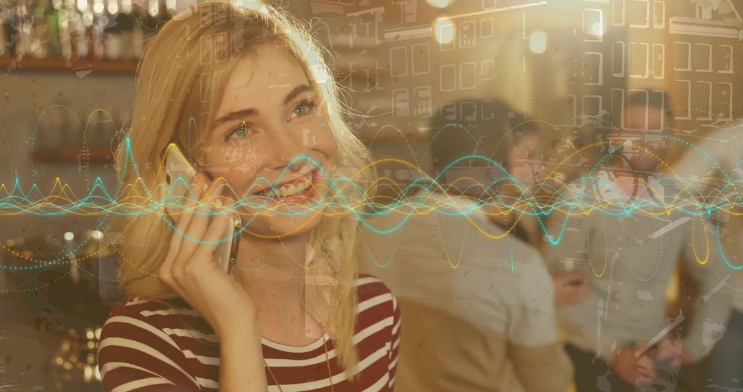 Woman Smiling While Using Smartphone in Trendy Bar Setting