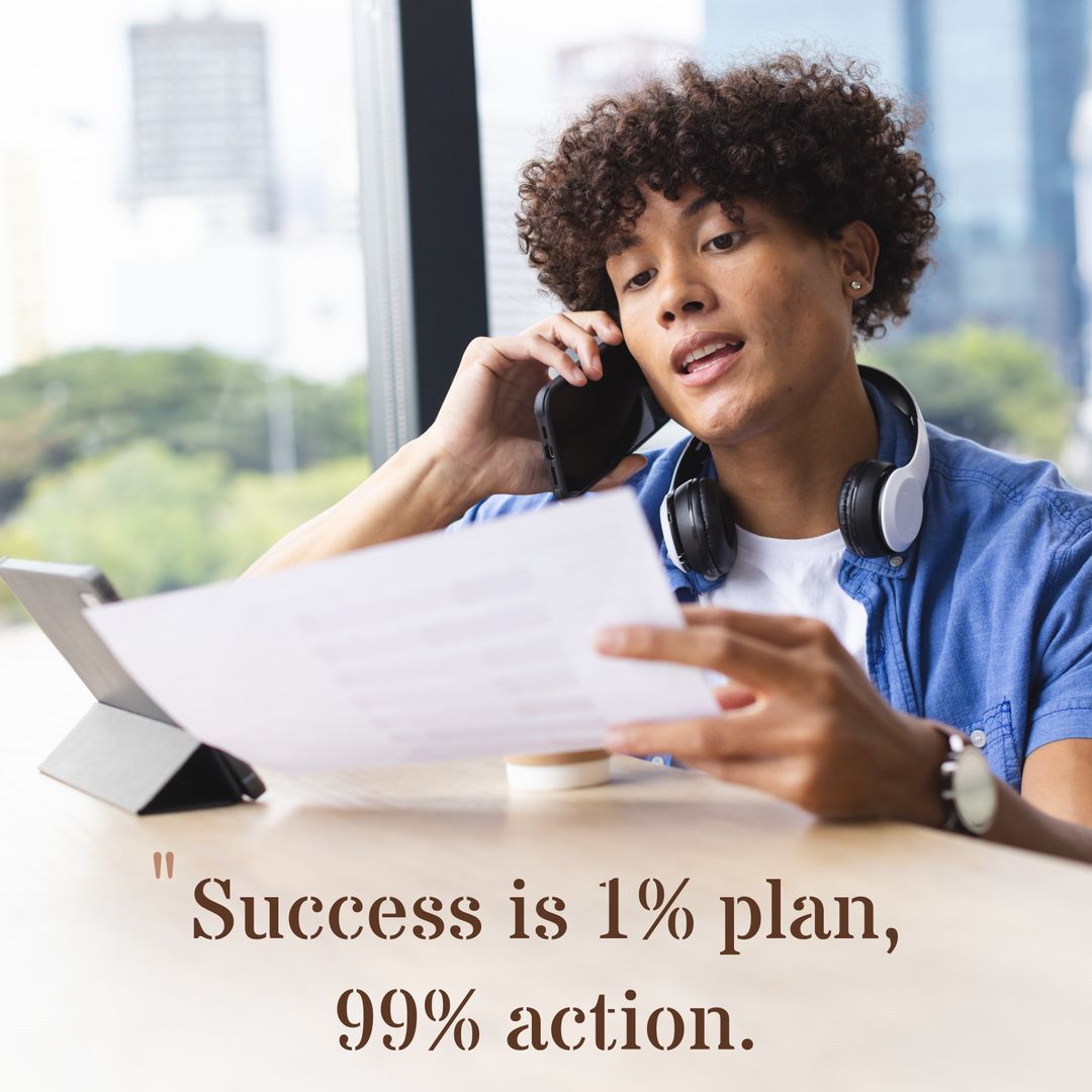 Young Professional Engaged in Phone Call with Documents