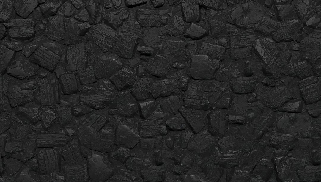 Anthracite coal texture close-up filling frame rugged charcoal surface industrial background