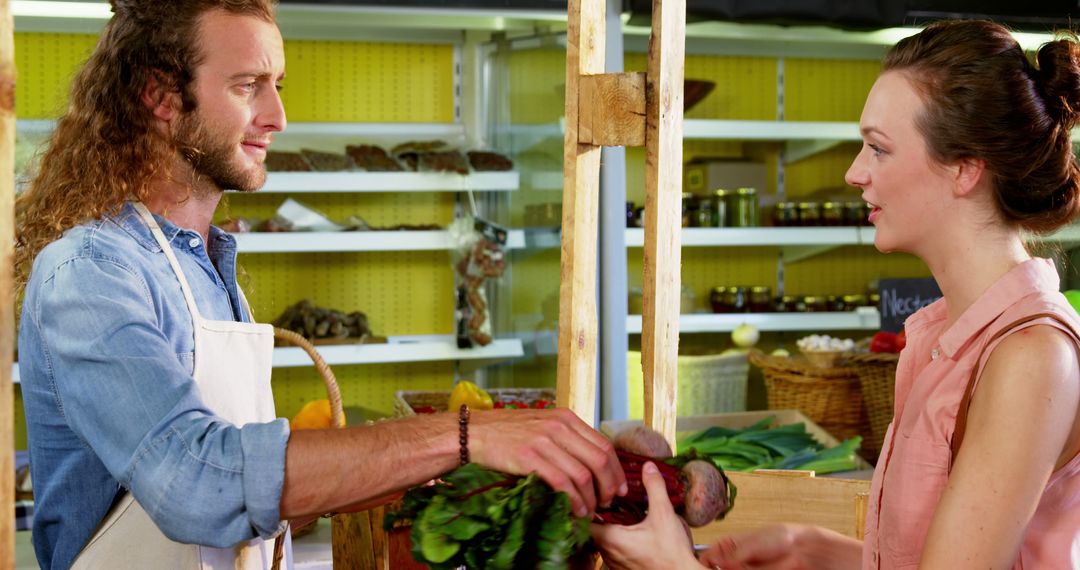 Customer purchasing vegetables in organic section of supermarket - Free Images, Stock Photos and Pictures on Pikwizard.com