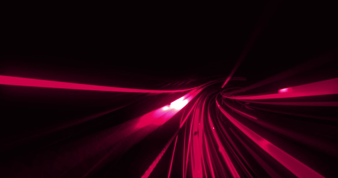 Neon Pink Light Trails Over Black Background