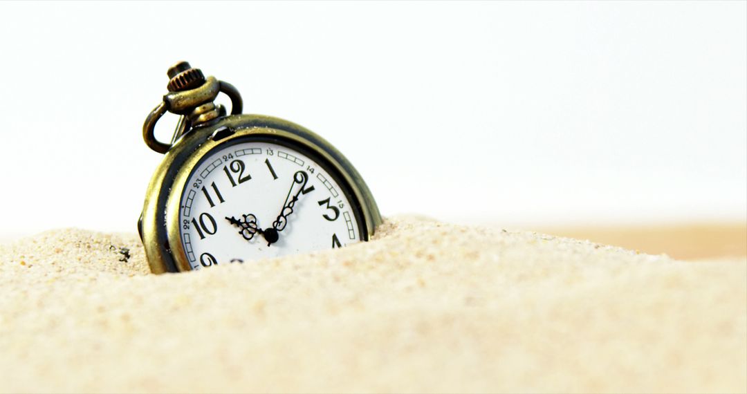 Vintage Pocket Watch Half-Buried in Sand Illustrating Passage of Time - Free Images, Stock Photos and Pictures on Pikwizard.com