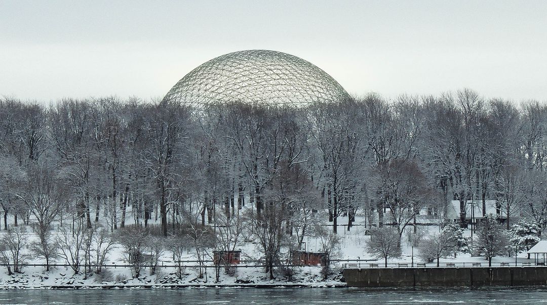 Geodesic Dome Amidst Snow-Covered Trees by River - Free Images, Stock Photos and Pictures on Pikwizard.com