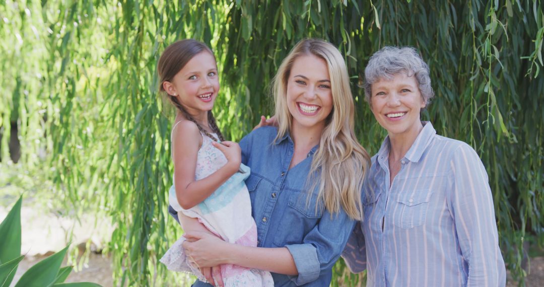 Three Generations of Women Smiling Outdoors in Nature - Free Images, Stock Photos and Pictures on Pikwizard.com