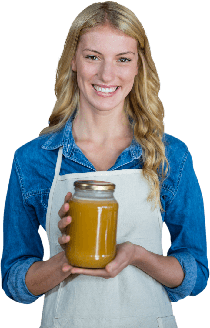Woman Holding Transparent Honey Jar with Smile and Denim Outfit