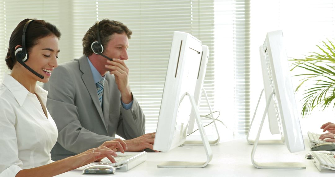 Customer Service Representatives Providing Support Using Headsets - Free Images, Stock Photos and Pictures on Pikwizard.com