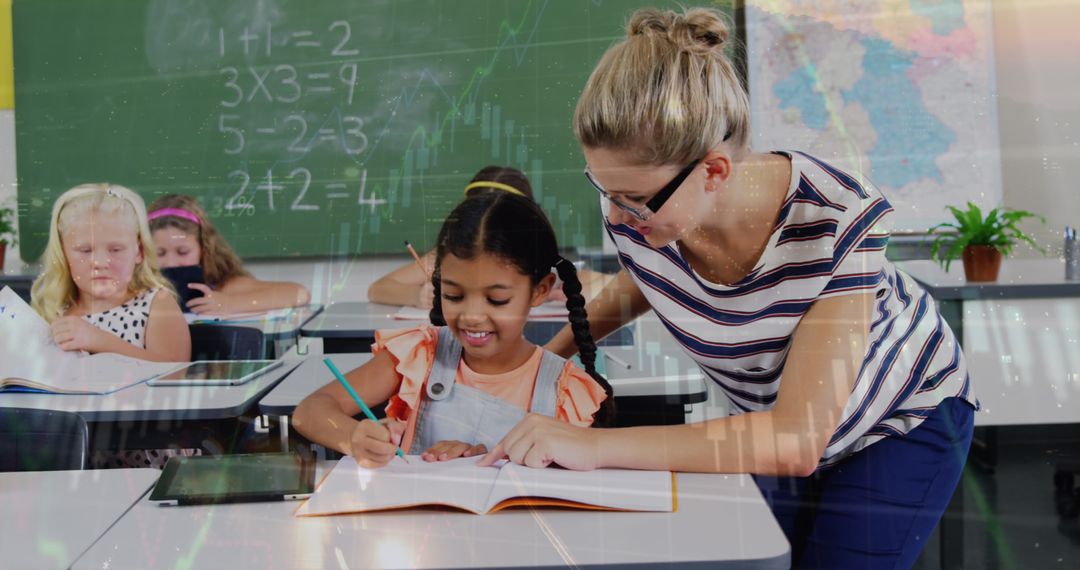 Teacher Guiding Young Multiracial Students in Classroom