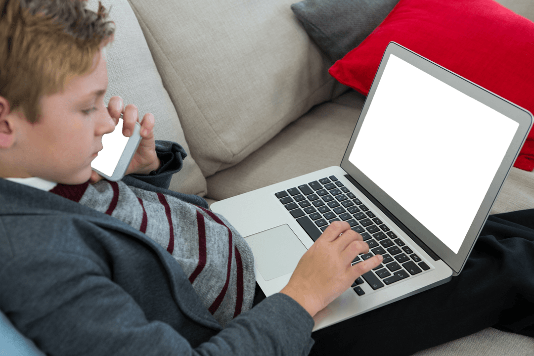 Transparent Screen Child Multitasking on Laptop and Phone