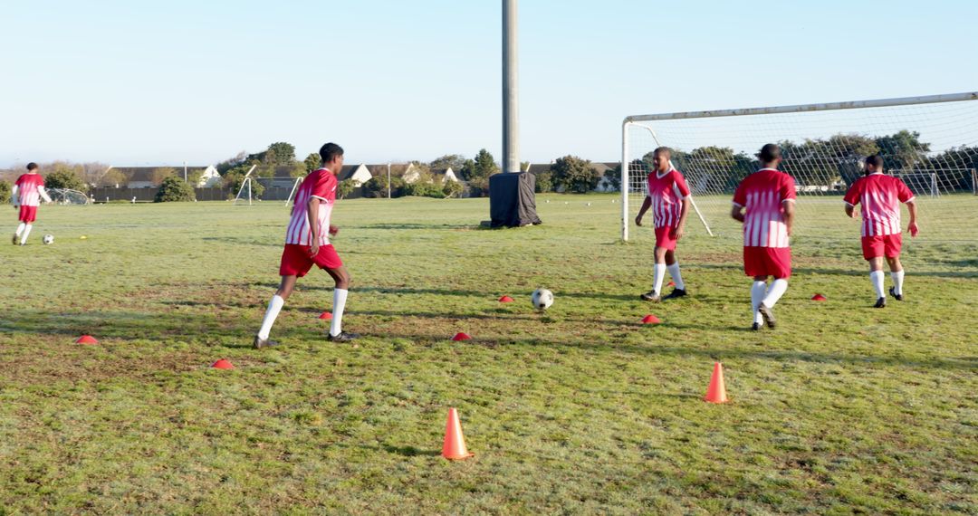 Team Passing Practice on Suburban Soccer Field