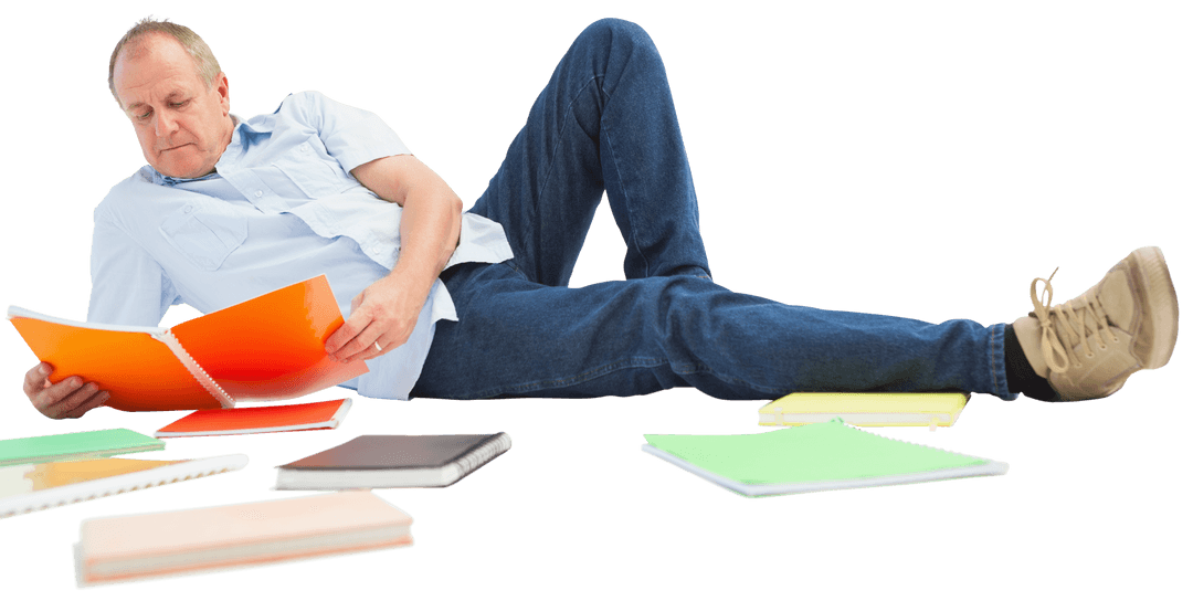 Senior Man Lying on Floor Reading on Transparent Background