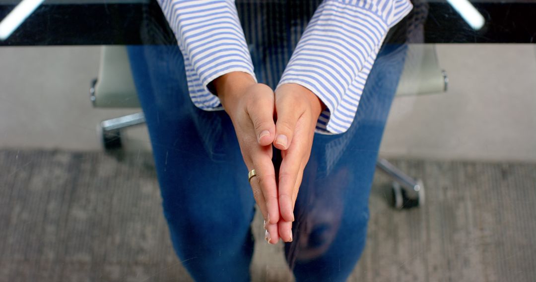 Professional with Enthusiastic Hand Gestures in Business Meeting