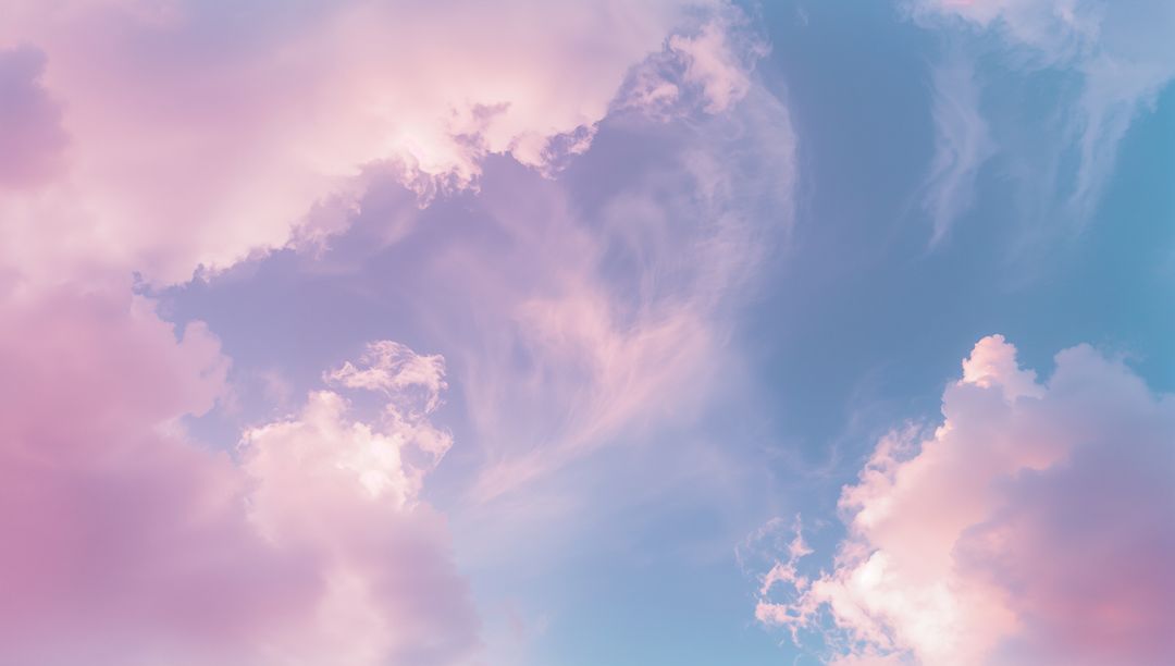 Dreamy Pastel Cloudscape with Soft Pink and Lavender Hues