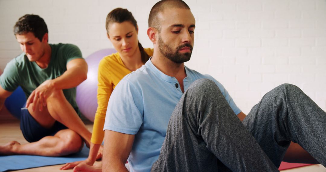 Group Meditation Class in Modern Wellness Studio - Free Images, Stock Photos and Pictures on Pikwizard.com