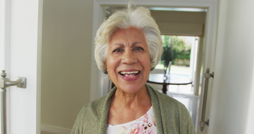 Portrait of Smiling Senior Woman Enjoying Time at Home