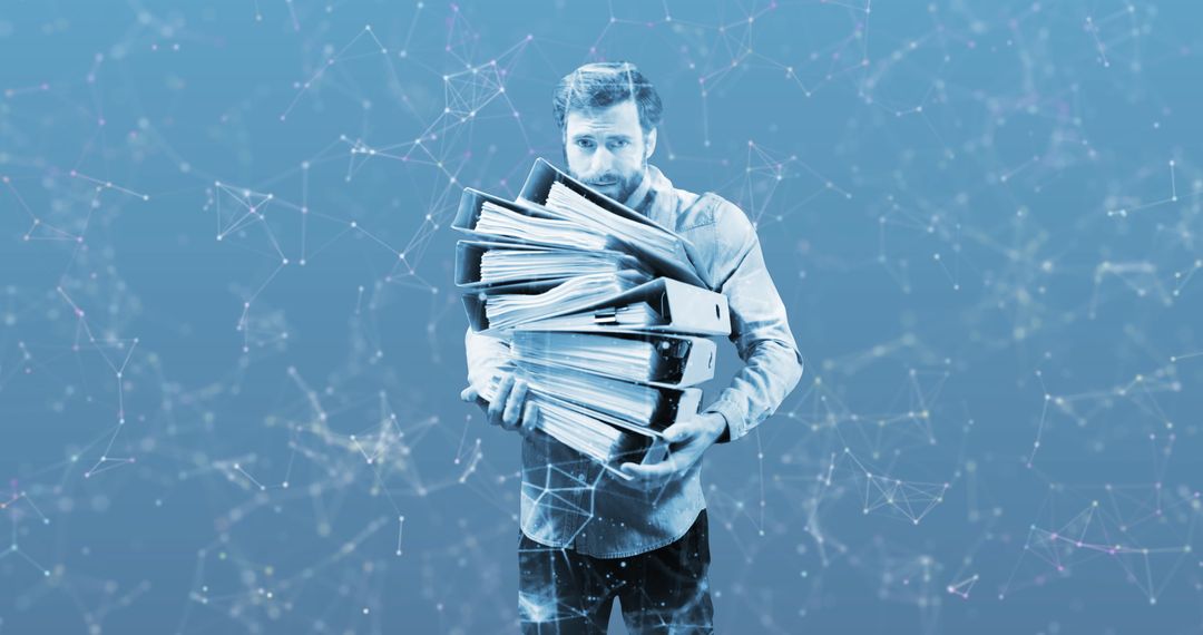 Overwhelmed Businessman Carrying Stack of Binders