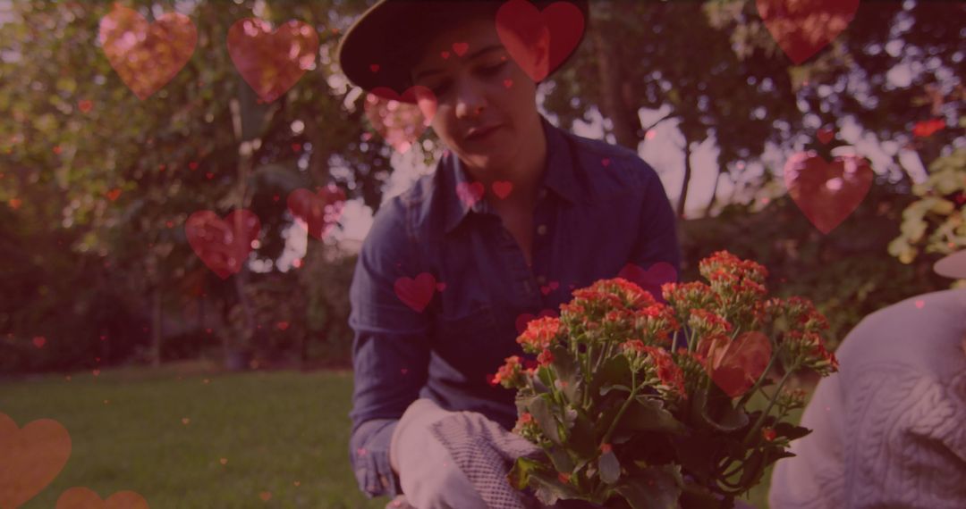 Caucasian Woman Gardening with Heart Overlay Emphasis on Love