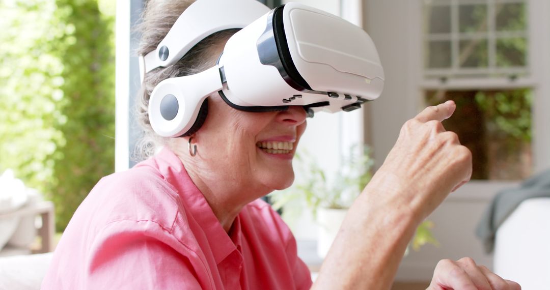Senior Woman Enjoying Virtual Reality Experience at Home