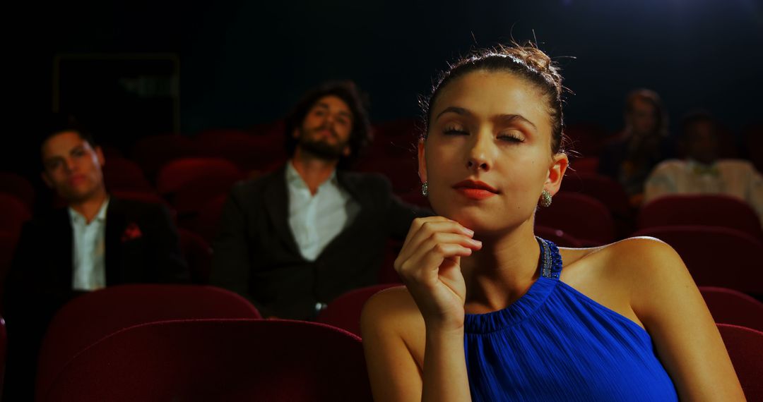 Contemplative Woman in Movie Theater Captivated by Film - Free Images, Stock Photos and Pictures on Pikwizard.com