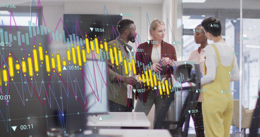 Diverse Team Analyzing Financial Graphs in Office Meeting