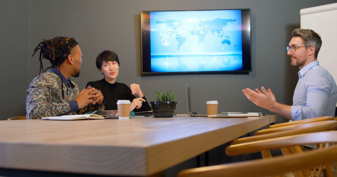 Business Meeting with Diverse Group Discussing Strategies