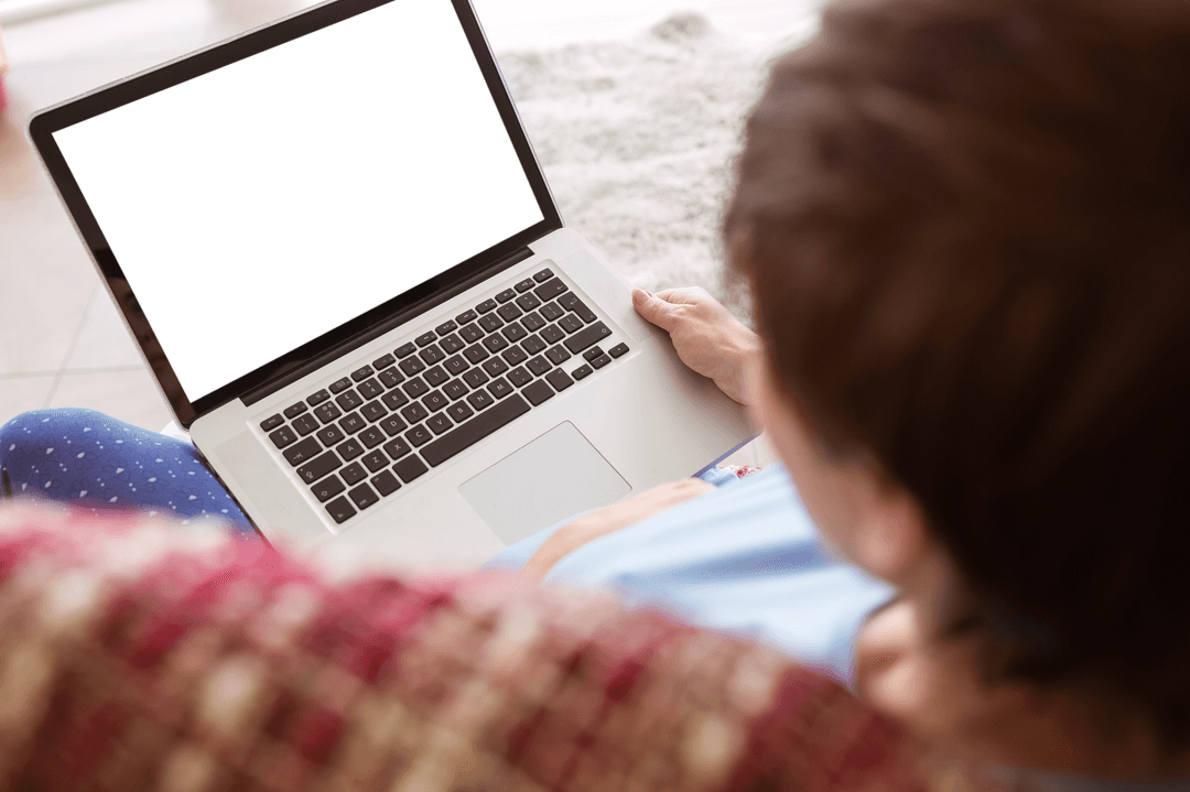 Pregnant Woman Browsing Laptop at Home With Transparent Space on Screen