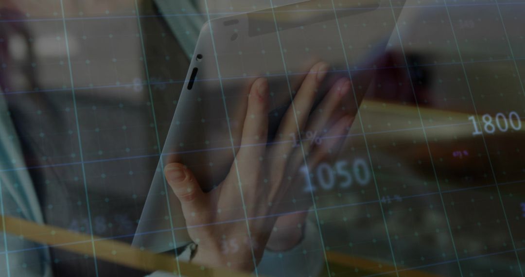 Professional Analyzing Digital Data on Tablet in Modern Office