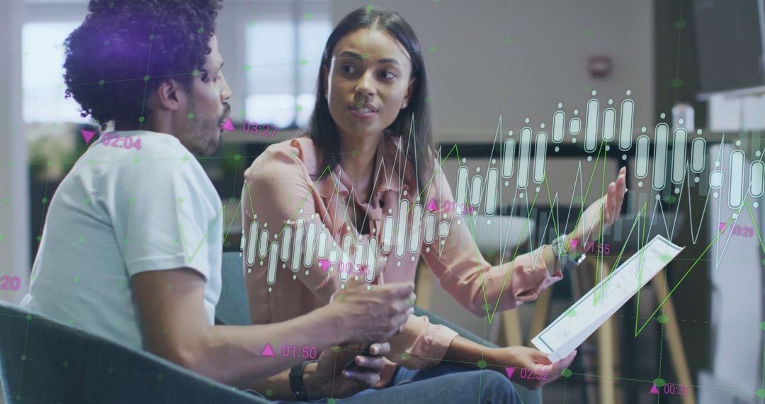 Diverse Team Discussing Financial Data Visualization in Modern Office