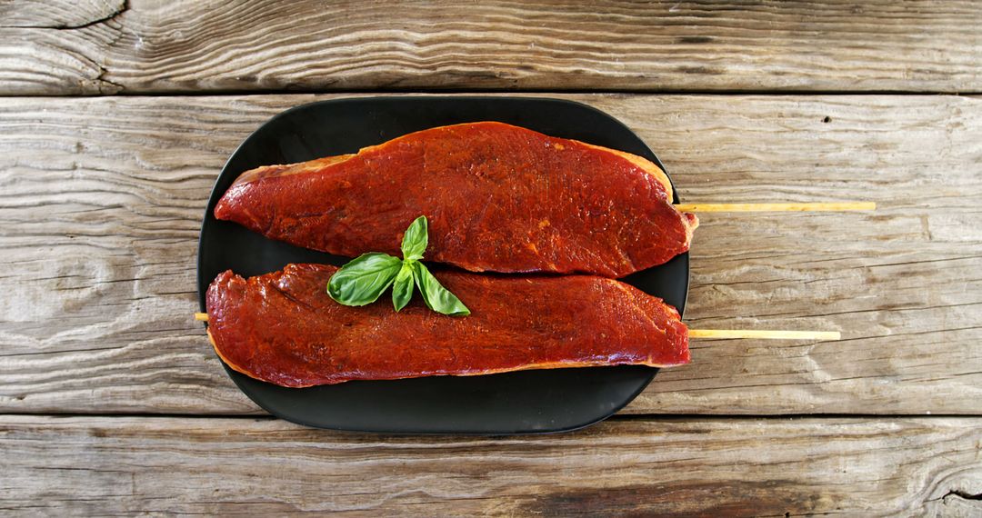 Two Seasoned Raw Beef Skewers on Wooden Table - Free Images, Stock Photos and Pictures on Pikwizard.com