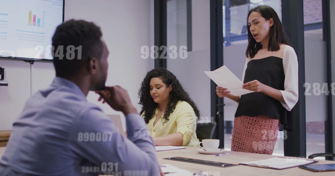 Diverse Professionals Engaged in Data-Driven Business Meeting