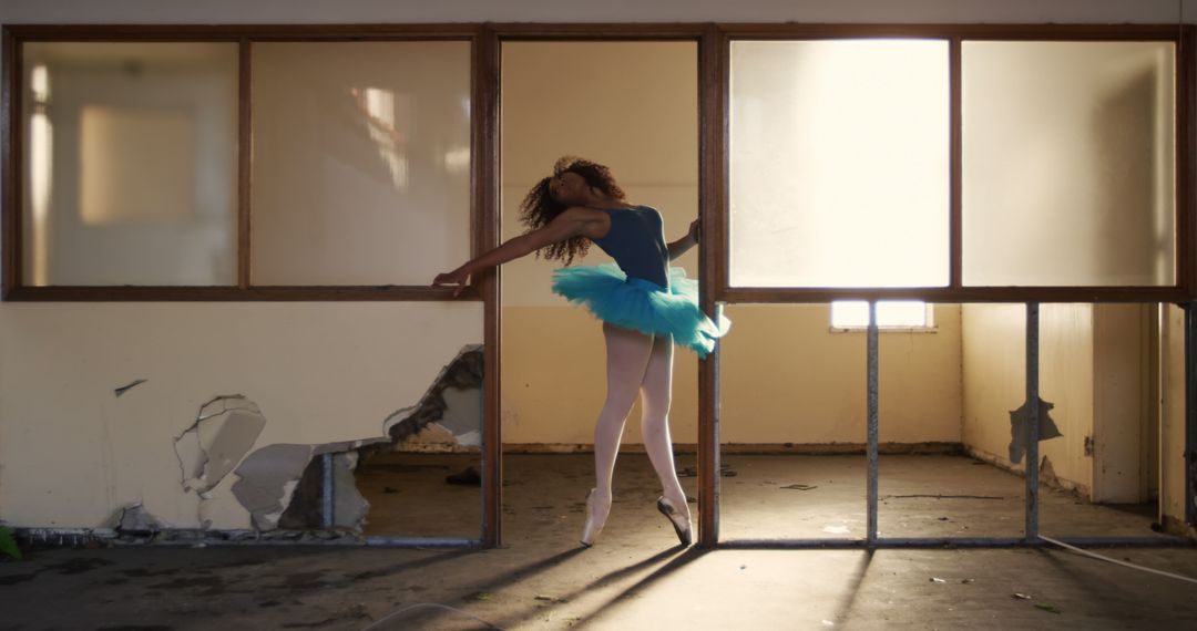 Ballet Dancer Practicing in Abandoned Warehouse