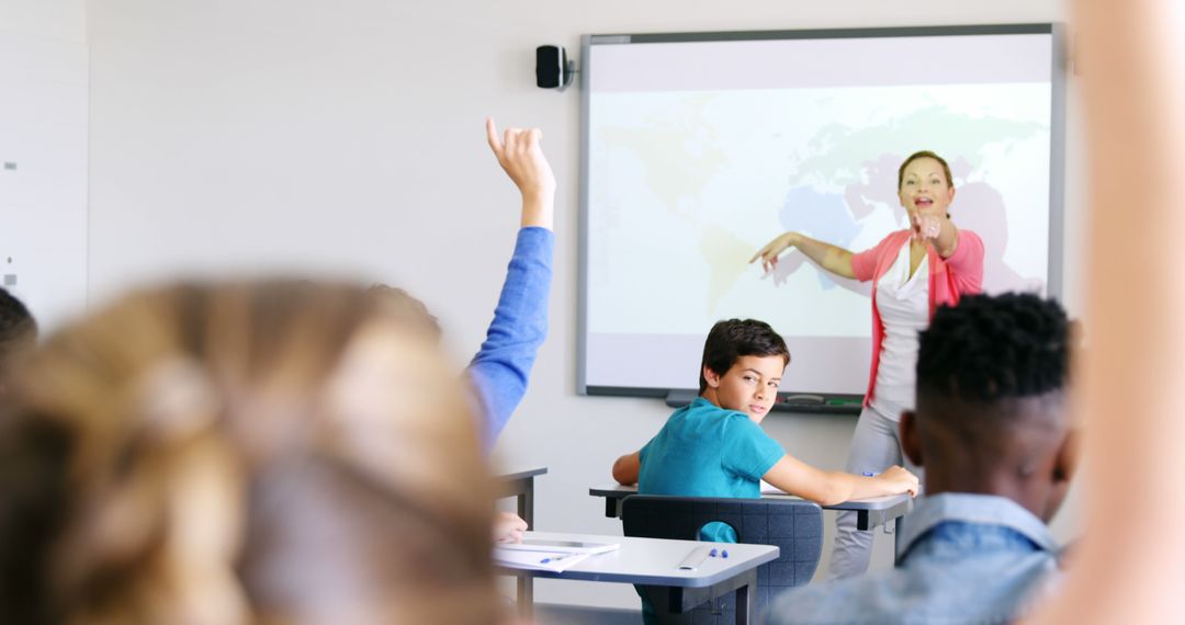 Engaged Multiracial Students Raising Hands in Classroom - Free Images, Stock Photos and Pictures on Pikwizard.com