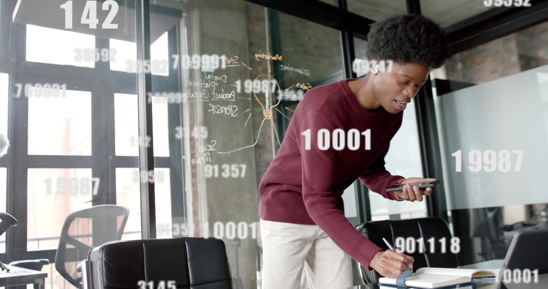 Businessman Analyzing Data in Tech-Driven Office Environment