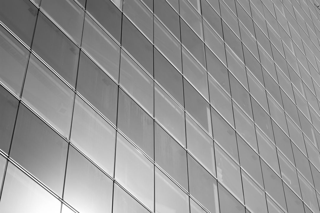 Modern Geometric Glass Building Facade with Abstract Patterns - Free Images, Stock Photos and Pictures on Pikwizard.com