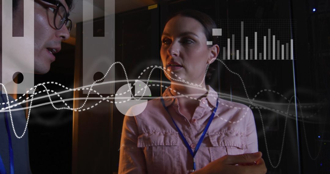 Two Professionals Discussing Technology and Data Analytics