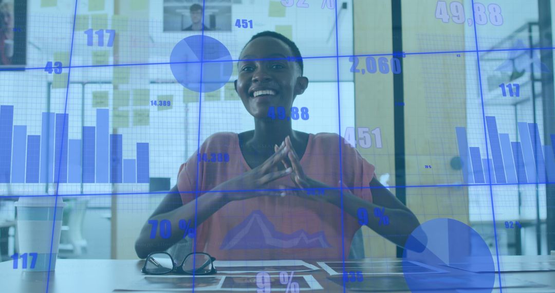 Smiling Professional Analyzes Data and Technology in Modern Office