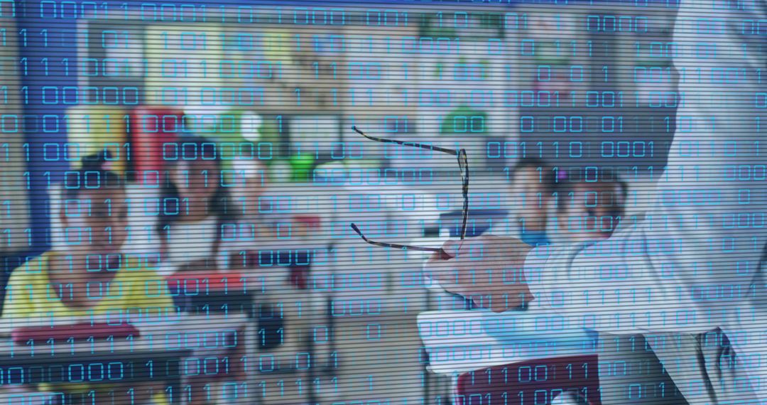 Mature teacher gesturing with glasses and binary overlay teaching digital coding classroom