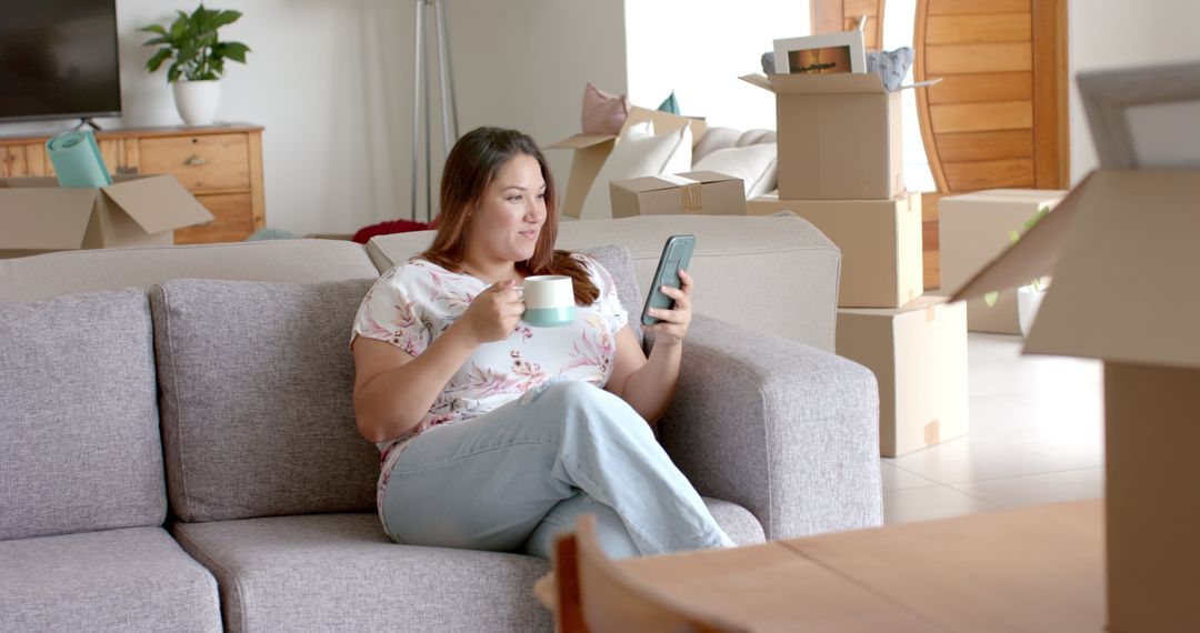 Plus Size Woman Relaxing After Moving into New Home