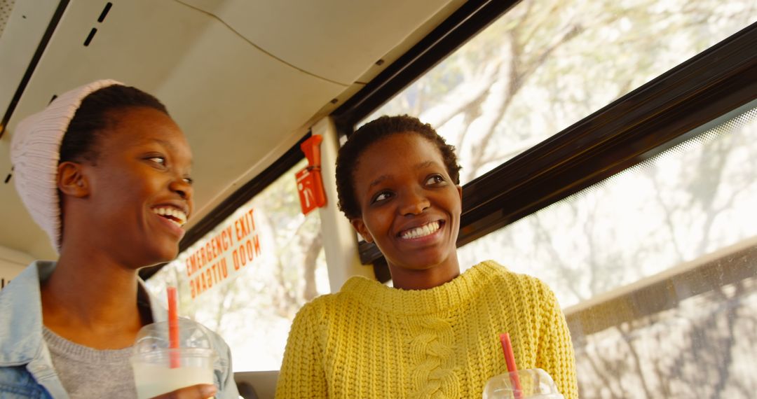 Joyful Twins Enjoying a Bus Ride Together