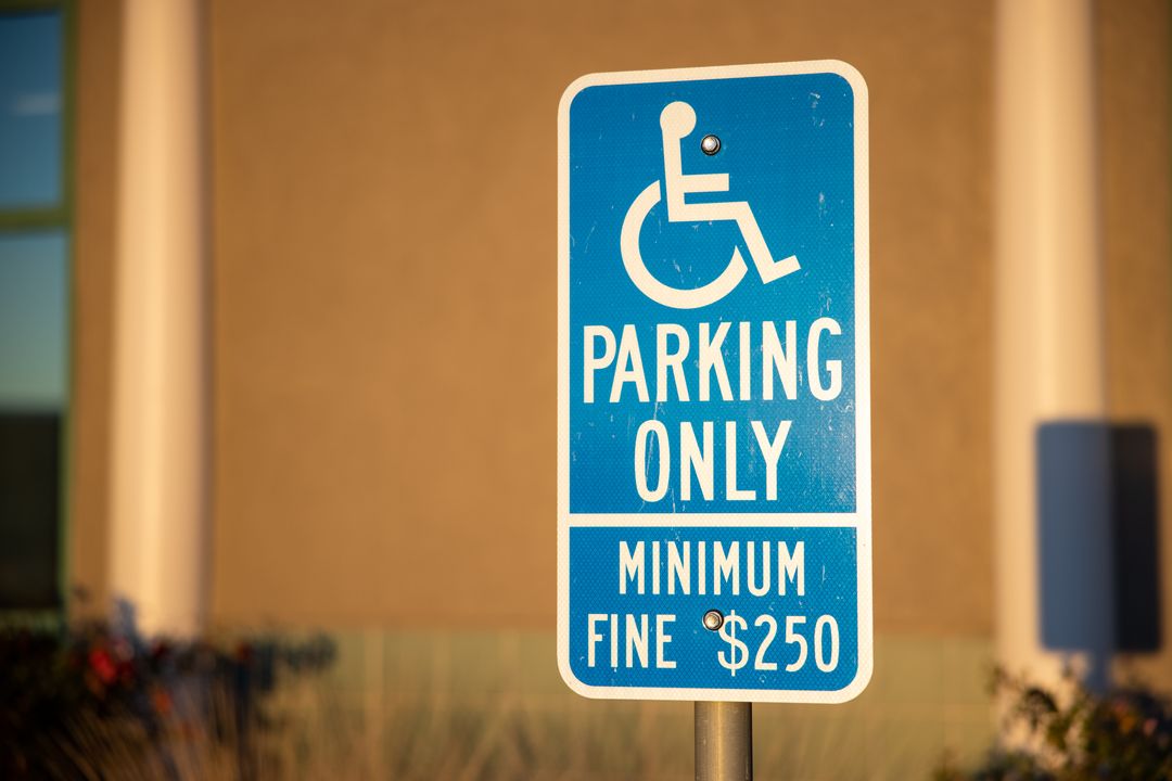 Handicap Parking Sign with Fine Notice for Accessibility Compliance